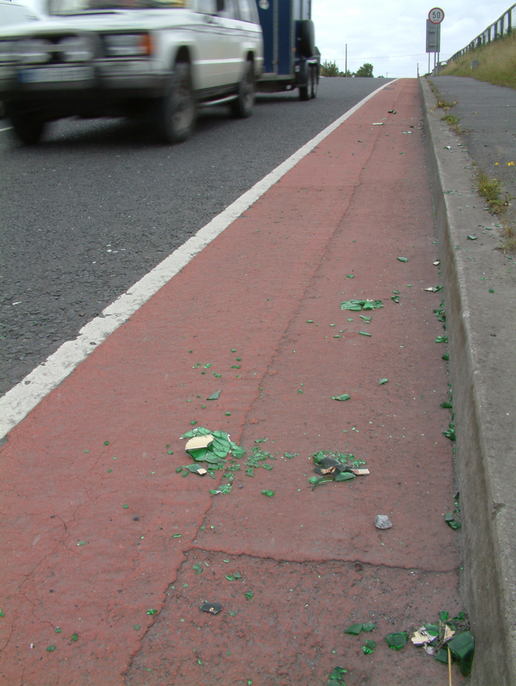 Parkmore road - glass in the cycle lane